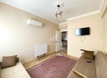 One-bedroom furnished apartment, 60m², in a residence with a swimming pool in the center of Yenişehir, Mersin ID-14560 фото-8