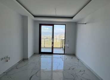 Двухкомнатная квартира, 55м², с великолепным видом в новой элитной новостройке в Махмутларе, Аланья ID-14570 фото-7