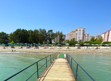 Spacious apartment 2 + 1, 120m², with a designer interior on the first coastline in Cesmeli, Mersin ID-14566 фото-18