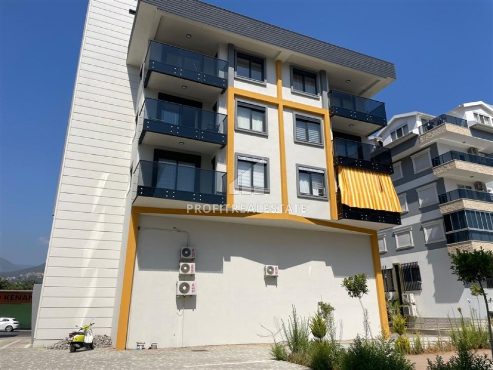 Двухкомнатные апартаменты 55м2, без мебели, в новой жилой резиденции, в 250 метрах от моря в Кестеле, Аланья ID-14581 фото-1