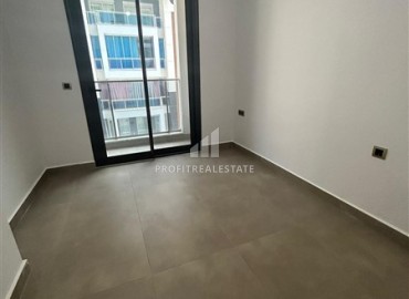 One-bedroom unfurnished apartment, 55m2, in a new residential residence with facilities, 200 meters from the sea, Mahmutlar, Alanya ID-14583 фото-8