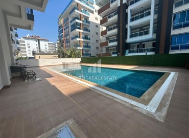 Spacious unfurnished one-bedroom apartment, 60m2, with a sea view, in a new building with facilities, Mahmutlar, Alanya ID-14584 фото-11