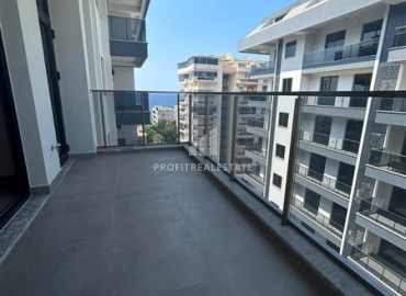 Spacious unfurnished one-bedroom apartment, 60m2, with a sea view, in a new building with facilities, Mahmutlar, Alanya ID-14584 фото-14