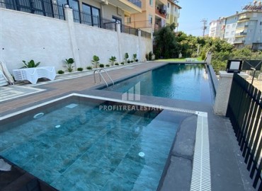 One-bedroom apartment, 55m², in a residence with good facilities at the foot of the mountains in Oba, Alanya ID-14588 фото-2