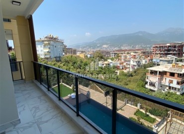 One-bedroom apartment, 55m², in a residence with good facilities at the foot of the mountains in Oba, Alanya ID-14588 фото-10