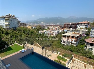 One-bedroom apartment, 55m², in a residence with good facilities at the foot of the mountains in Oba, Alanya ID-14588 фото-11