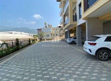 One-bedroom apartment, 55m², in a residence with good facilities at the foot of the mountains in Oba, Alanya ID-14588 фото-18