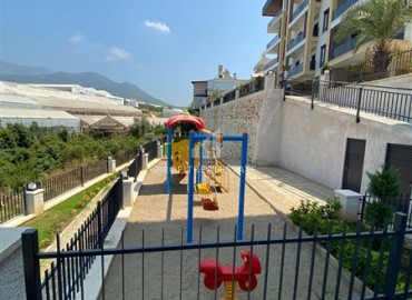 One-bedroom apartment, 55m², in a residence with good facilities at the foot of the mountains in Oba, Alanya ID-14588 фото-19