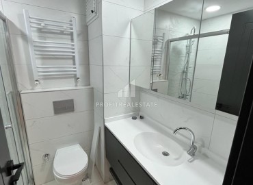 Spacious one-bedroom apartment, 71m², in a new residence in Tomyuk, Mersin ID-14590 фото-8