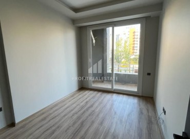 Spacious one-bedroom apartment, 71m², in a new residence in Tomyuk, Mersin ID-14590 фото-10