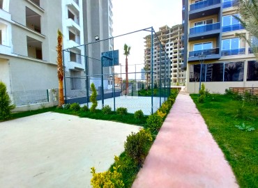 Spacious one-bedroom apartment, 71m², in a new residence in Tomyuk, Mersin ID-14590 фото-18
