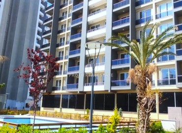 Spacious one-bedroom apartment, 71m², in a new residence in Tomyuk, Mersin ID-14590 фото-19