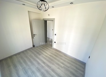 Квартира с одной спальней, 55м², в доме городского типа на окончательном этапе строительства в Тедже, Мерсин ID-14592 фото-12