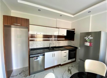 Двухкомнатные апартаменты с мебелью и техникой, в новой резиденции, в 200 метрах от центра Махмутлара, Аланья, 60 м2 ID-14602 фото-3
