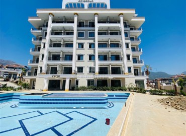 New one-bedroom apartment, 52m², in a residence with extensive facilities, in Oba, Alanya ID-14608 фото-2