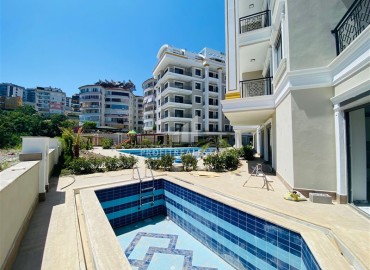 New one-bedroom apartment, 52m², in a residence with extensive facilities, in Oba, Alanya ID-14608 фото-14