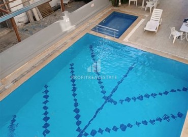 Недорогая квартира с одной спальней, 58м², в комплексе с бассейном с отличной локацией в Махмутларе, Алания ID-14637 фото-11