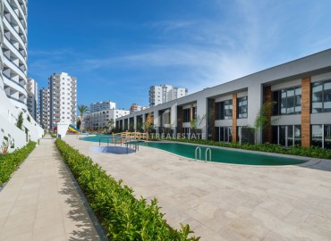 Просторная трехкомнатная квартира, 110м², в комфортабельной новой резиденции в Арпачбахшиш в районном центре Эрдемли ID-14643 фото-14