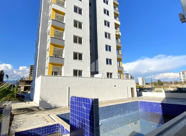 Трехкомнатная квартира, 115м², удачной планировки в Арпачбахшиш в районном центре Эрдемли, в 300м от моря ID-14645 фото-1