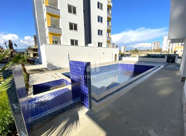 Трехкомнатная квартира, 115м², удачной планировки в Арпачбахшиш в районном центре Эрдемли, в 300м от моря ID-14645 фото-17