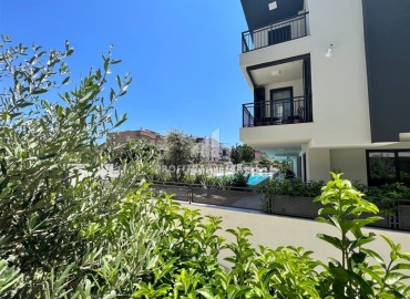Меблированные апартаменты 1+1, с собственным садом, в современной резиденции с олимпийским бассейном, Гюзельоба, Лара, Анталия, 50 м2 ID-14651 фото-15