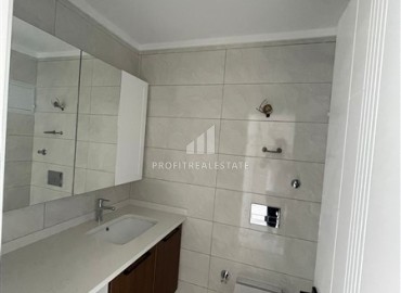 Новая двухкомнатная квартира 55 м2, с чистовой отделкой и кухонным гарнитуром, без мебели, в 150 метрах от моря, Каргыджаке, Аланья ID-14659 фото-15