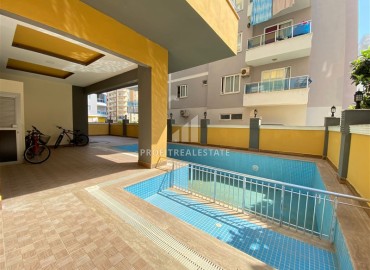Недорогие меблированные апартаменты 1+1 в центре Махмутлара, 60 м2 ID-14661 фото-14