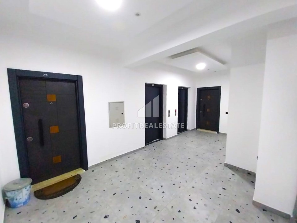 Квартира с двумя спальнями, 110м², на высоком этаже в доме городского типа в Чешмели, Эрдемли ID-12351 фото-2