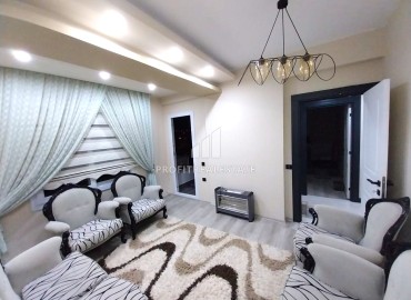 Квартира с двумя спальнями, 110м², на высоком этаже в доме городского типа в Чешмели, Эрдемли ID-12351 фото-9