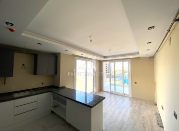 Новая квартира 1+1, 59м², в комплексе с хорошей инфраструктурой на этапе строительства в Тедже, Мерсин ID-14674 фото-5