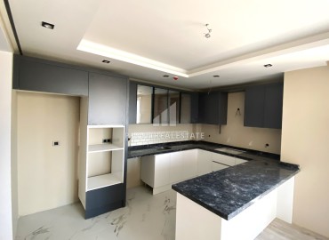 Новая квартира 1+1, 59м², в комплексе с хорошей инфраструктурой на этапе строительства в Тедже, Мерсин ID-14674 фото-6