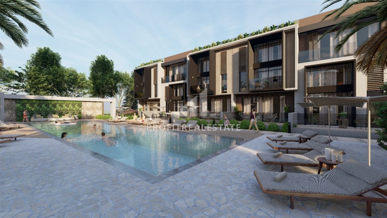 Привлекательный инвестиционный проект: квартиры и виллы 65-210 м2 в комплексах с инфраструктурой, Фамагуста, Северный Кипр ID-14736 фото-1