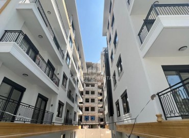 Апартаменты с одной спальней, 49м², в новом комплексе премиум класса в центре Алании, 550м от пляжа Кейкубат ID-14657 фото-13