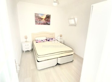 Недорогая меблированная квартира с одной спальней, 60м², в доме городского типа в районе Махмутлар, Алания ID-14764 фото-11