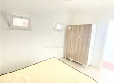 Недорогая меблированная квартира с одной спальней, 60м², в доме городского типа в районе Махмутлар, Алания ID-14764 фото-12