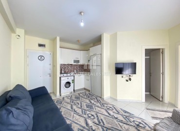 Меблированная квартира с одной спальней, 60м², в доме городского типа в центре Мерсина, в районе Енишехир ID-14789 фото-3