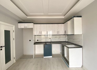 Комфортабельная квартира с одной спальней, 60м², в новом комплексе с инфраструктурой в районе Мезитли, Мерсин ID-14799 фото-6