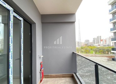 Комфортабельная квартира с одной спальней, 60м², в новом комплексе с инфраструктурой в районе Мезитли, Мерсин ID-14799 фото-13