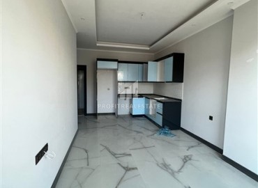 Квартира 1+1, 55м², с чистовой отделкой в новом проекте на окончательном этапе строительства в центре Алании, у пляжа Клеопатры ID-14806 фото-5