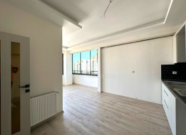 Трехкомнатная квартира с отдельной кухней, 120м², в комплексе на этапе строительства в районе Мезитли (Акдениз) ID-14470 фото-10