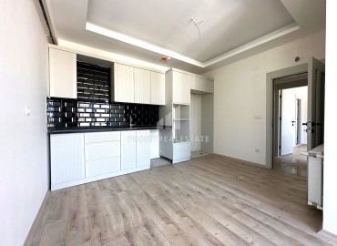 Трехкомнатная квартира с отдельной кухней, 120м², в комплексе на этапе строительства в районе Мезитли (Акдениз) ID-14470 фото-11