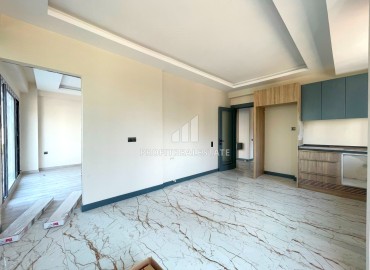 Трехкомнатная квартира с отдельной кухней, 105м², в комплексе на этапе строительства в районе Мезитли (Акдениз) ID-14814 фото-5