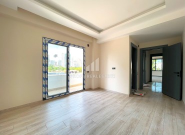 Трехкомнатная квартира с отдельной кухней, 105м², в комплексе на этапе строительства в районе Мезитли (Акдениз) ID-14814 фото-12