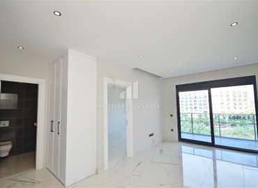 Новая квартира 1+1 в резиденции с богатой инфраструктурой, в 150 метрах от моря, Каргыджак, Аланья, 55 м2 ID-14854 фото-2