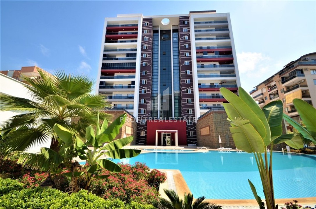 Готовая к проживанию, квартира 1+1, 81 м² с остекленным балконом, в 450м от моря в Махмутларе, Алания ID-14858 фото-1