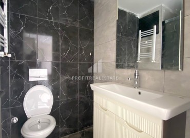 One-room apartment, 55m² in a cozy new building with a good location in the Yenisehir area, Mersin ID-14901 фото-12
