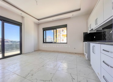 Новая трехкомнатная квартира, 65м², в комплексе с инфраструктурой, в 850м от моря в Авсалларе, Алания ID-14916 фото-6