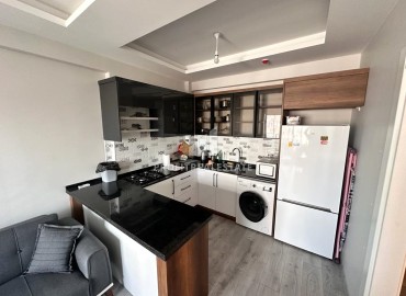 Furnished one-bedroom apartment, 55m², in a new premium residence in the Tomyuk area, Erdemli ID-14927 фото-6