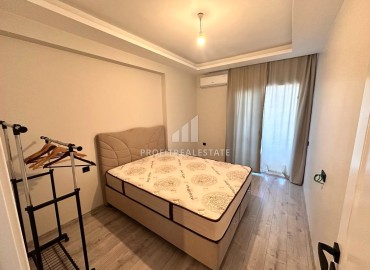 Меблированная двухкомнатная квартира, 55м², в новом комплексе премиум класса в районе Томюк, Эрдемли ID-14927 фото-7