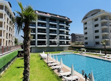 Stylish one-bedroom apartment 50m², with sea views, 100 meters from the beach, Kargicak, Alanya ID-14932 фото-3